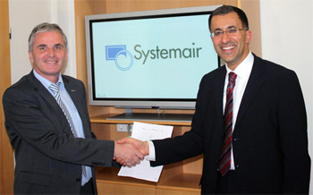 Kurt Maurer, Managing Director of Systemair and Dr Fathi Tarada, Managing Director of Mosen, after the signing the agreement in Boxberg-Windischbuch, Germany