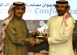 Husny Saeed, General Manager, Intertek receiving the Award