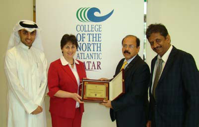 Award for The College of The North Atlantic. From left to right: Khaled Mohsen, Monica Kennedy, Ramiz Gabrial and Seenu Pillai