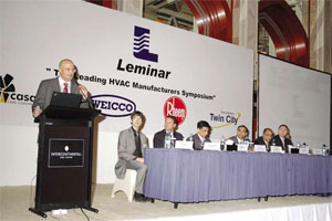 Navin Valrani makes a point during his opening speech. To his left are the representatives from Casals, Weicco and Rheem